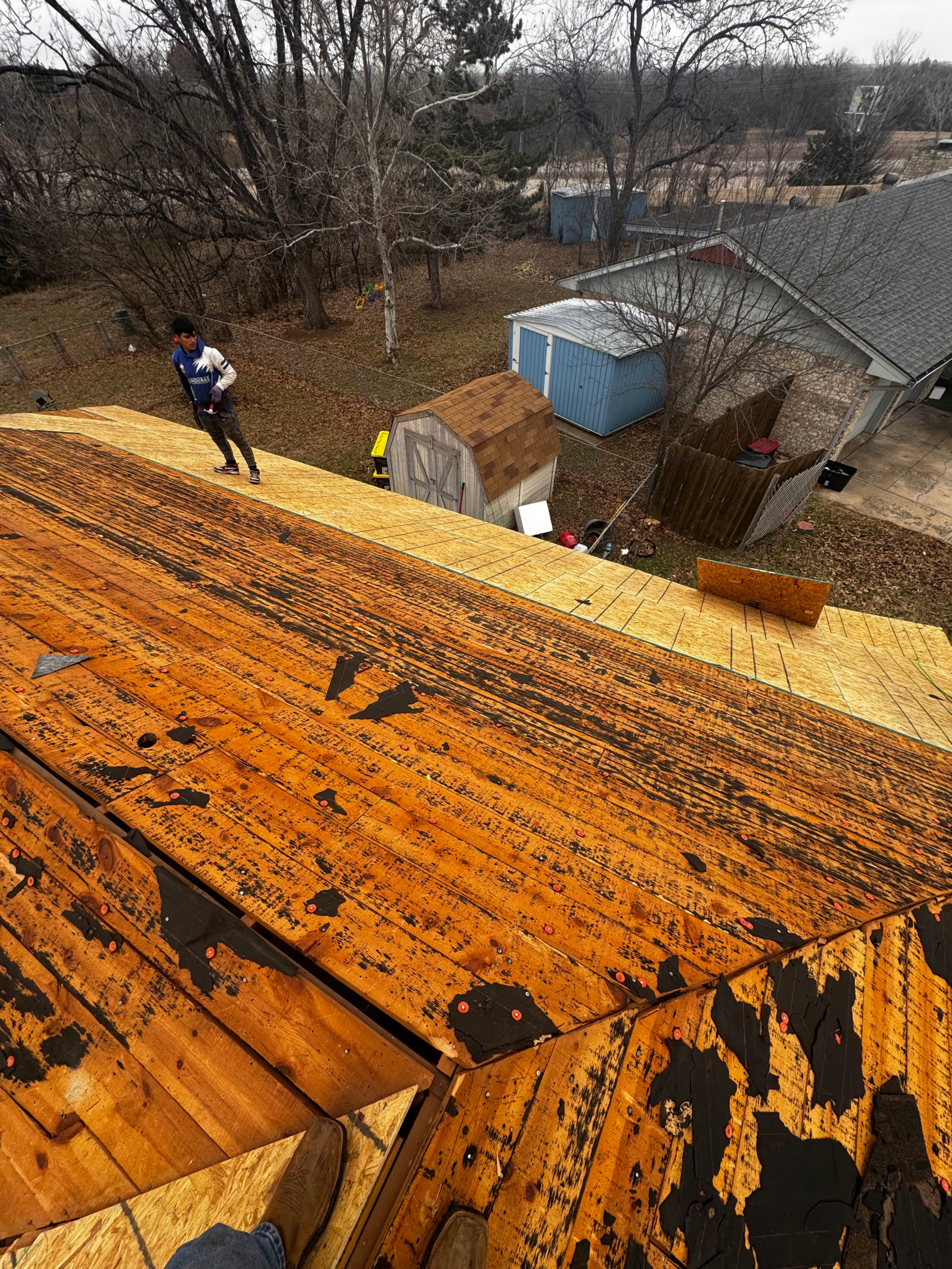 Oklahoma Roofing Experts crew during active roof installation in the Ardmore, Oklahoma area
